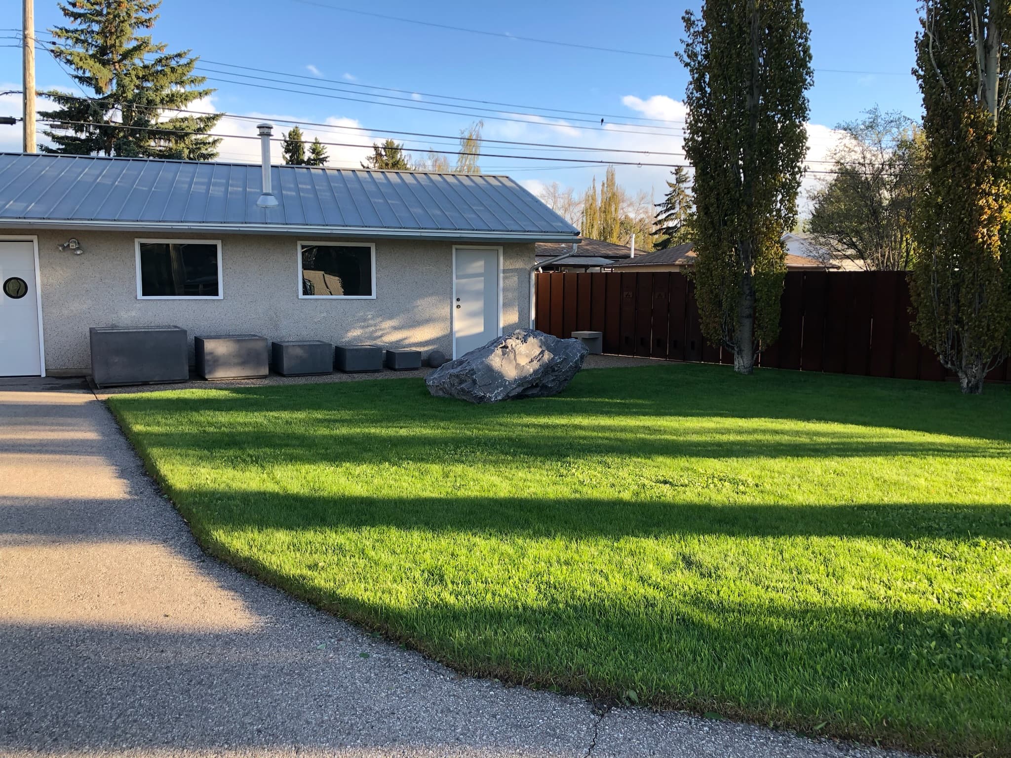Calgary Lawn Services project in Calgary by Taha Landscaping